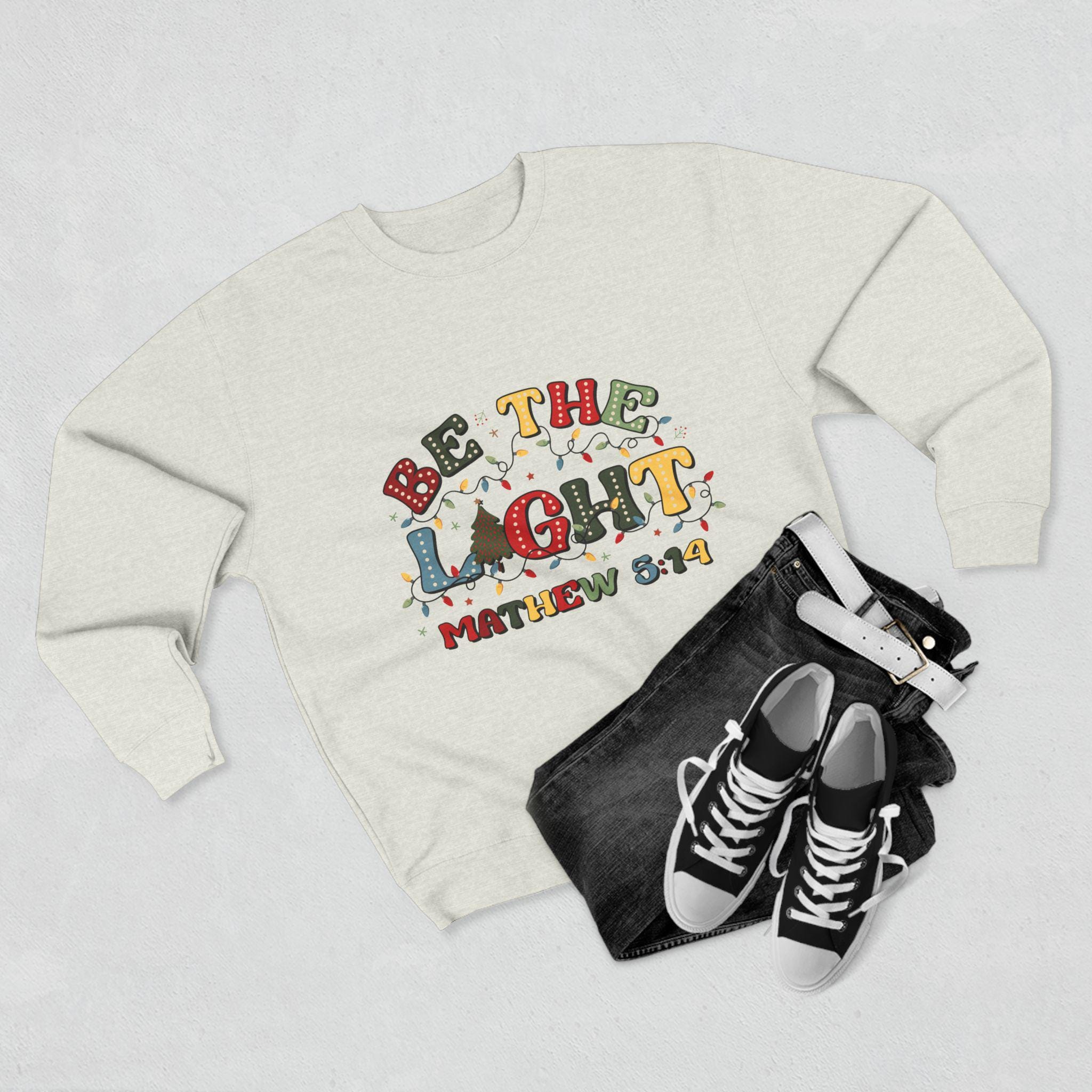 Be The Light Christmas Crewneck Sweatshirt: Festive Holiday Jumper