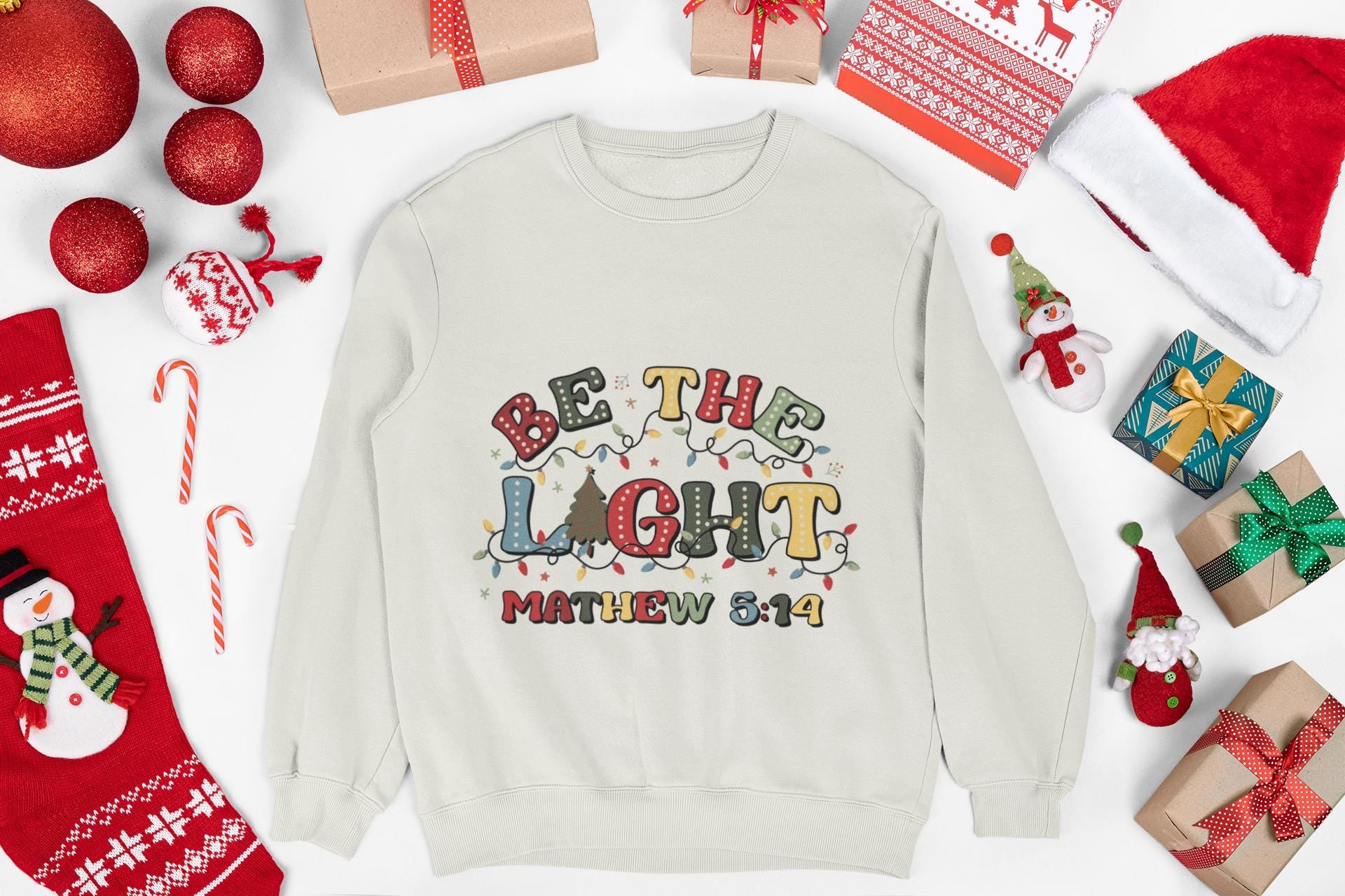 Be The Light Christmas Crewneck Sweatshirt: Festive Holiday Jumper
